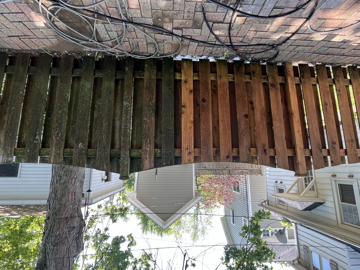 Fence power washing before and after